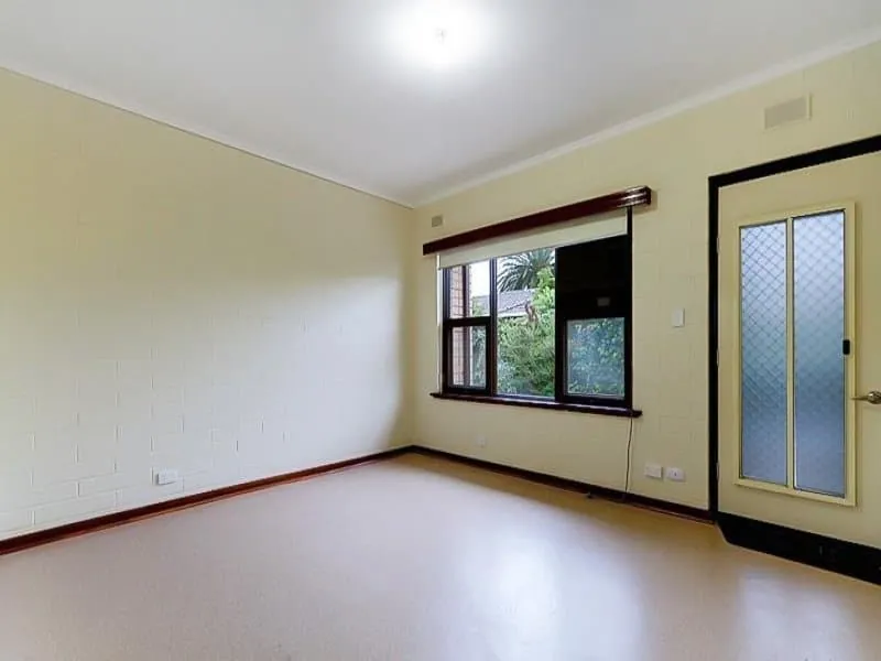 Lounge room with corner windows and a glazed external door